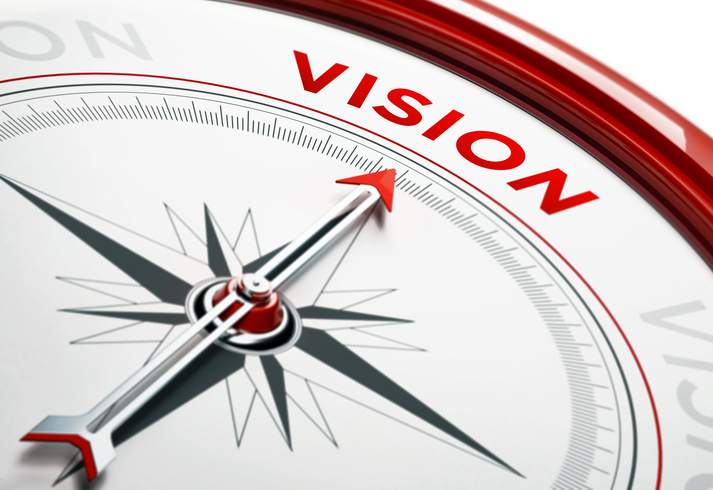 Vision Concept: Arrow of A Compass Pointing Vision Text